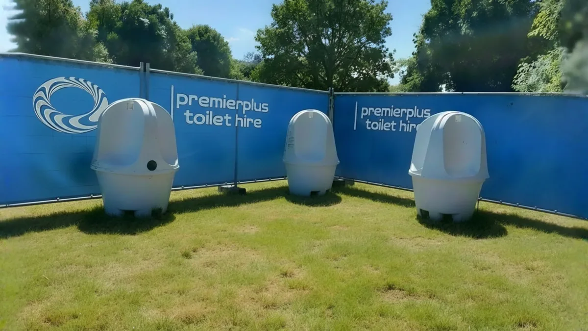 PremierPlus portable urinals set up on grass at an outdoor sports event
